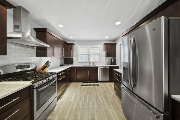 Interior, Kitchen, Recessed Lighting, Stainless Steel Appliances, Wood Texture Flooring