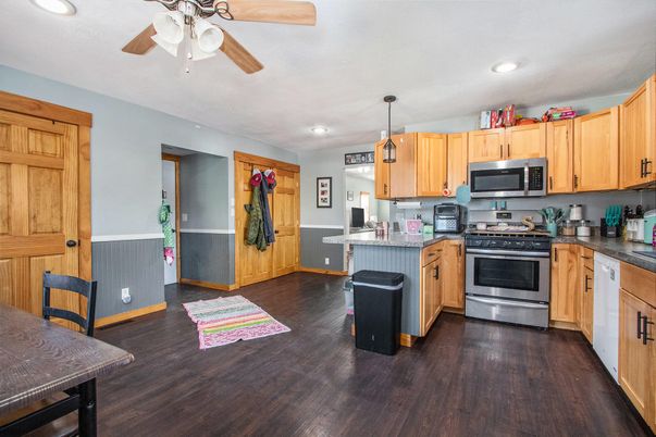 Interior, Kitchen, Pendant Lights, Recessed Lighting, Stainless Steel Appliances, Wood Texture Flooring