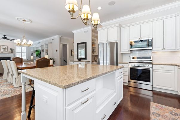 Chandelier, Dining room, Interior, Kitchen, Recessed Lighting, Stainless Steel Appliances, Wood Texture Flooring
