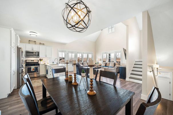 Chandelier, Dining room, Interior, Kitchen, Living room, Stainless Steel Appliances, Wood Texture Flooring