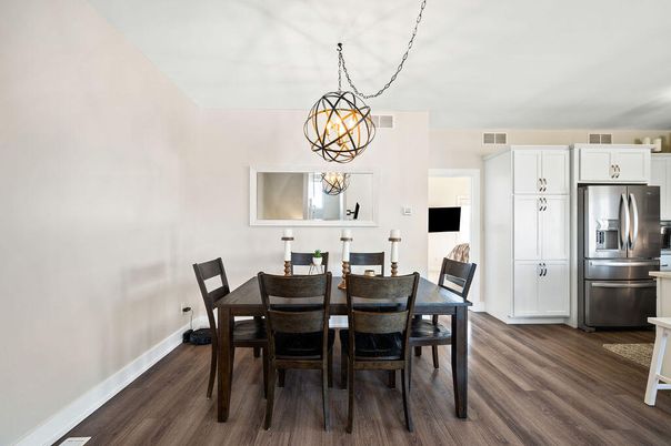 Chandelier, Dining room, Interior, Kitchen, Stainless Steel Appliances, Wood Texture Flooring