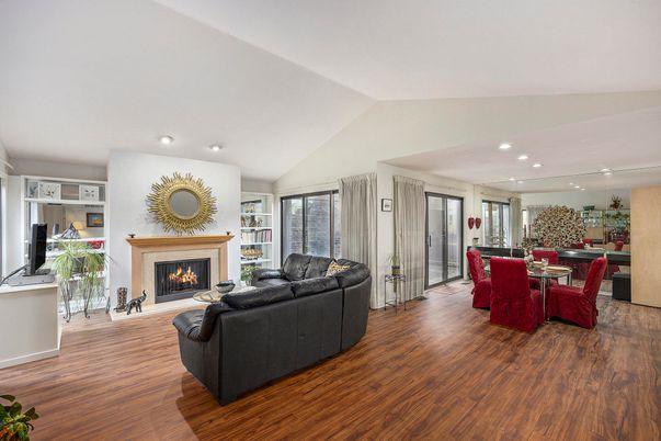 Dining room, Fireplace, Interior, Living room, Recessed Lighting, Wood Texture Flooring