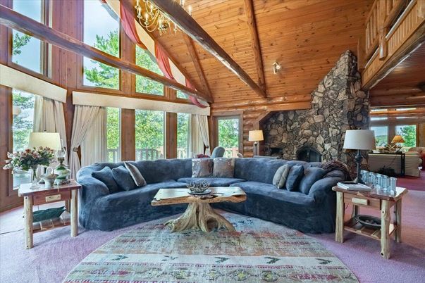 Chandelier, Fireplace, Interior, Living room, Stone Walls, Wooden Beams, Wooden Ceilings