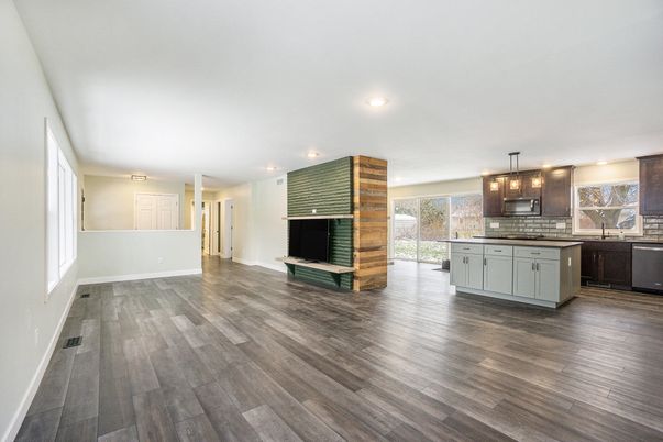 Fireplace, Interior, Kitchen, Pendant Lights, Recessed Lighting, Wood Texture Flooring