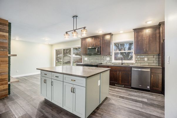 Interior, Kitchen, Pendant Lights, Recessed Lighting, Stainless Steel Appliances, Wood Texture Flooring