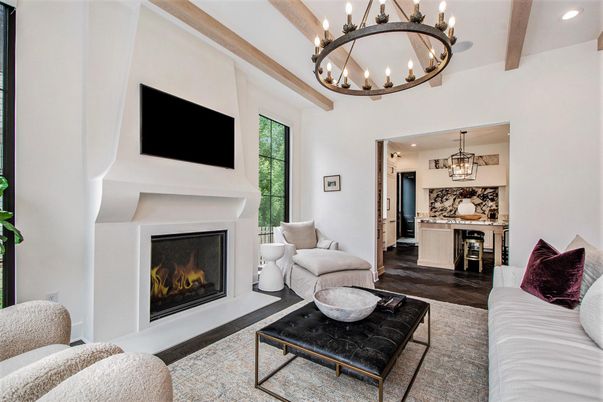 Chandelier, Fireplace, Interior, Living room, Pendant Lights, Recessed Lighting, Wooden Beams, Wood Texture Flooring