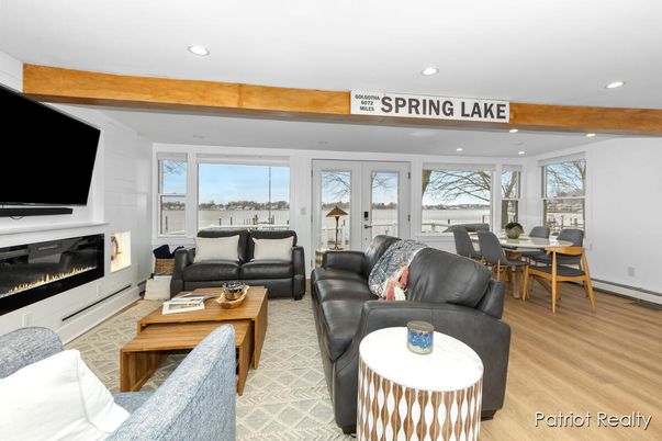 Dining room, Fireplace, Interior, Living room, Recessed Lighting, Wooden Beams, Wood Texture Flooring