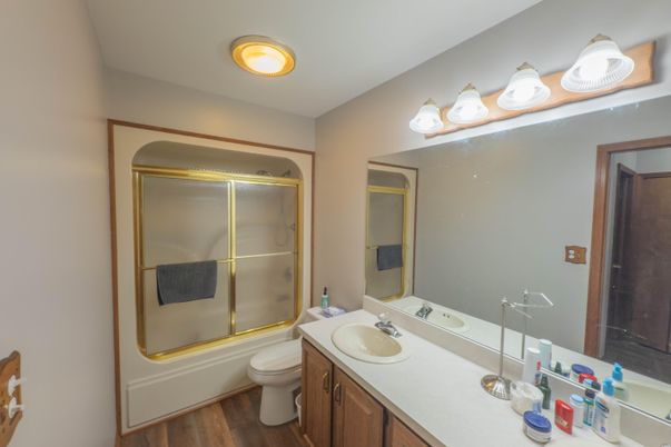 Bathroom, Dual Sink Vanities, Glass Shower, Interior, Wood Texture Flooring
