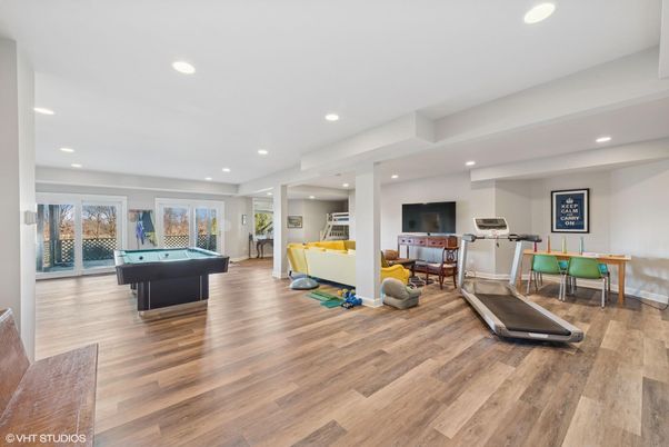 Billiard Table, Fitness Equipment, Game Room, Interior, Living room, Recessed Lighting, Wood Texture Flooring