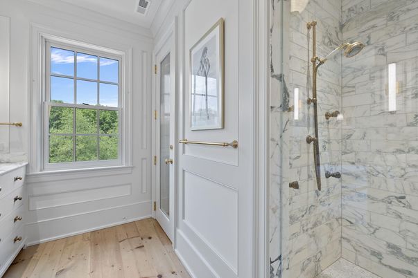 Bathroom, Glass Shower, Interior, Marble Walls, Wood Texture Flooring