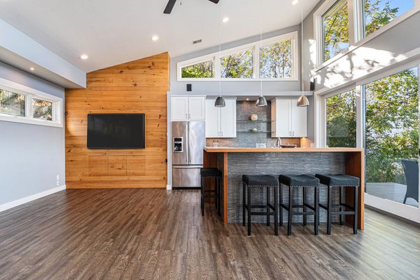 Interior, Kitchen, Pendant Lights, Recessed Lighting, Stainless Steel Appliances, Wood Texture Flooring, Wooden Walls