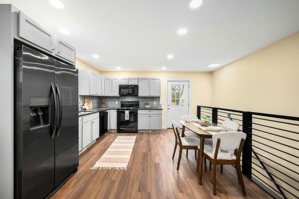 Dining room, Interior, Kitchen, Recessed Lighting, Stainless Steel Appliances, Wood Texture Flooring