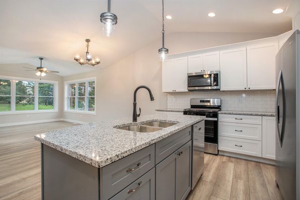 Chandelier, Interior, Kitchen, Pendant Lights, Recessed Lighting, Stainless Steel Appliances, Wood Texture Flooring