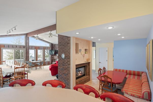 Dining room, Fireplace, Interior, Living room, Recessed Lighting, Stone Walls