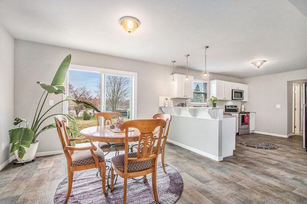 Dining room, Interior, Kitchen, Pendant Lights, Stainless Steel Appliances, Wood Texture Flooring
