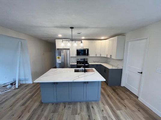 Interior, Kitchen, Pendant Lights, Recessed Lighting, Stainless Steel Appliances, Wood Texture Flooring