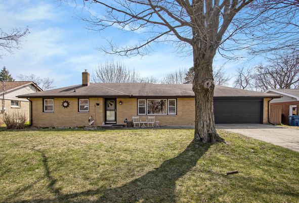 Attached, Backyard, Exterior, Facade, Brick Facade, Ranch
