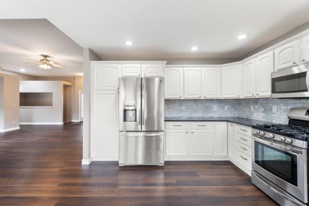 Interior, Kitchen, Recessed Lighting, Stainless Steel Appliances, Wood Texture Flooring