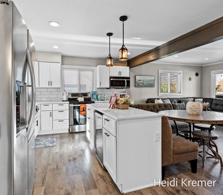 Dining room, Interior, Kitchen, Living room, Pendant Lights, Recessed Lighting, Stainless Steel Appliances, Wood Texture Flooring