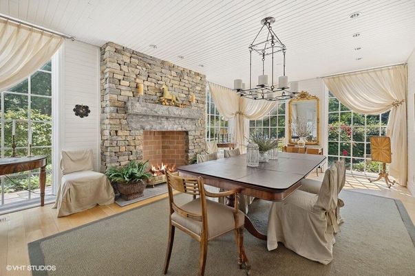 Chandelier, Dining room, Fireplace, Interior, Recessed Lighting, Stone Walls, Wood Texture Flooring