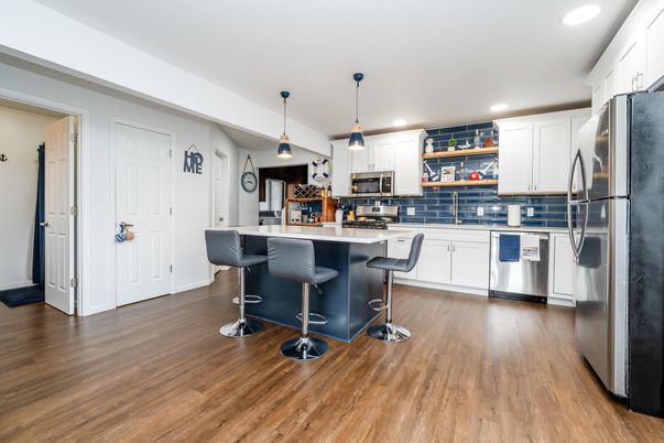Interior, Kitchen, Pendant Lights, Recessed Lighting, Stainless Steel Appliances, Wood Texture Flooring
