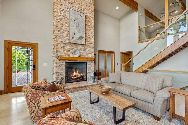 Fireplace, Interior, Living room, Recessed Lighting, Stone Walls, Wood Texture Flooring