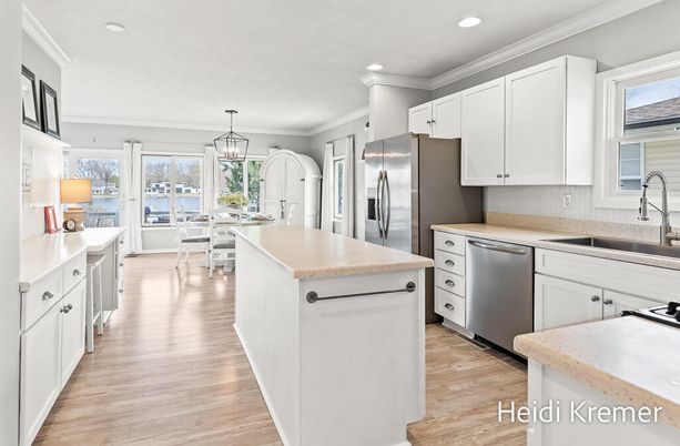Dining room, Interior, Kitchen, Pendant Lights, Recessed Lighting, Stainless Steel Appliances, Wood Texture Flooring