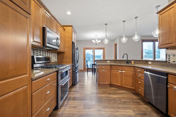 Chandelier, Interior, Kitchen, Pendant Lights, Recessed Lighting, Stainless Steel Appliances, Wood Texture Flooring