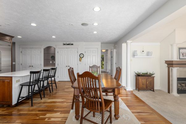 Dining room, Fireplace, Interior, Kitchen, Recessed Lighting, Wood Texture Flooring