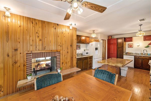 Fireplace, Interior, Kitchen, Pendant Lights, Wood Texture Flooring, Wooden Walls