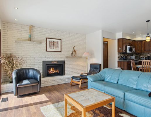 Fireplace, Interior, Kitchen, Living room, Pendant Lights, Recessed Lighting, Stone Walls, Wood Texture Flooring