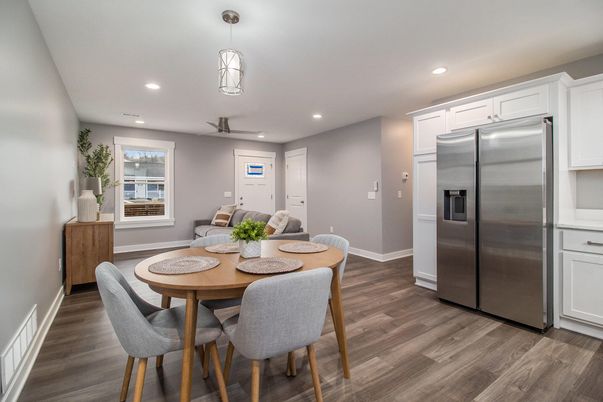 Dining room, Interior, Kitchen, Pendant Lights, Recessed Lighting, Stainless Steel Appliances, Wood Texture Flooring
