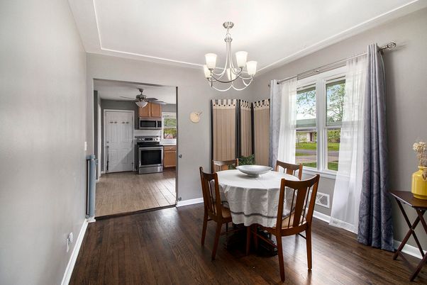 Chandelier, Dining room, Interior, Kitchen, Stainless Steel Appliances, Wood Texture Flooring