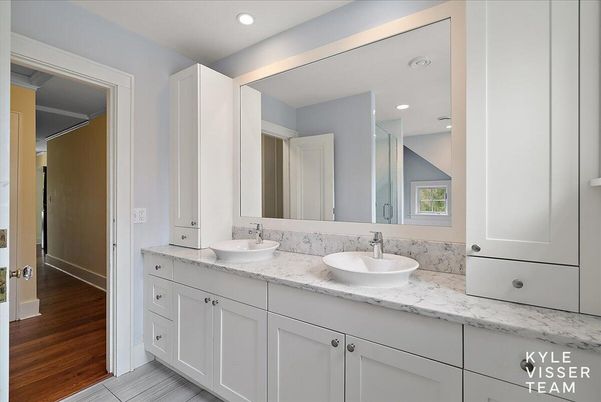 Bathroom, Dual Sink Vanities, Interior, Recessed Lighting, Wood Texture Flooring