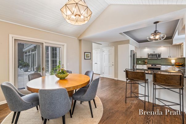 Chandelier, Dining room, Interior, Kitchen, Pendant Lights, Stainless Steel Appliances, Wood Texture Flooring