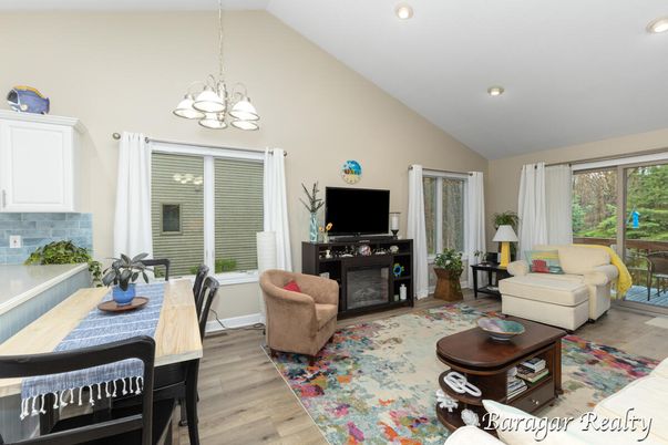 Chandelier, Dining room, Fireplace, Interior, Living room, Recessed Lighting, Wood Texture Flooring