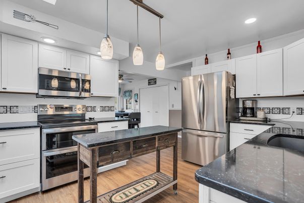 Interior, Kitchen, Pendant Lights, Recessed Lighting, Stainless Steel Appliances, Wood Texture Flooring