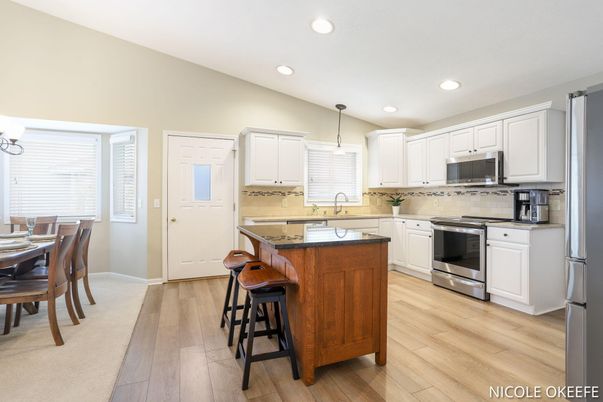 Dining room, Interior, Kitchen, Pendant Lights, Recessed Lighting, Stainless Steel Appliances, Wood Texture Flooring