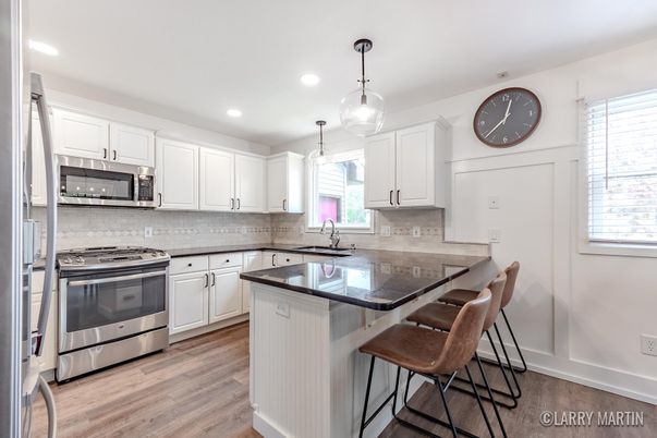Interior, Kitchen, Pendant Lights, Recessed Lighting, Stainless Steel Appliances, Wood Texture Flooring