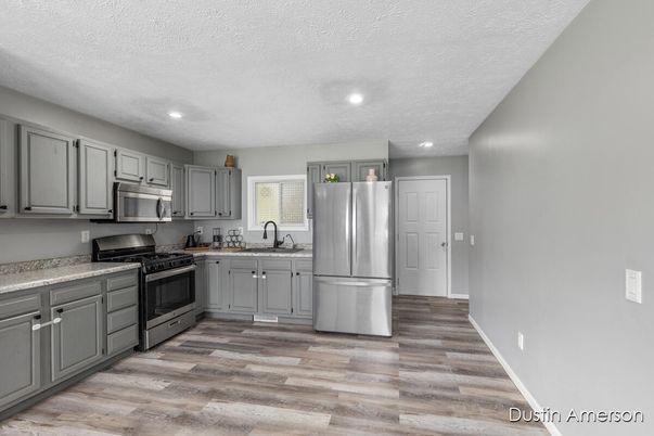 Interior, Kitchen, Recessed Lighting, Stainless Steel Appliances, Wood Texture Flooring