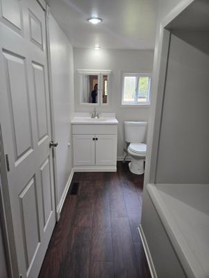 Bathroom, Dual Sink Vanities, Interior, Recessed Lighting, Wood Texture Flooring