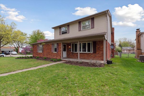Exterior, Facade, Brick Facade, American Foursquare