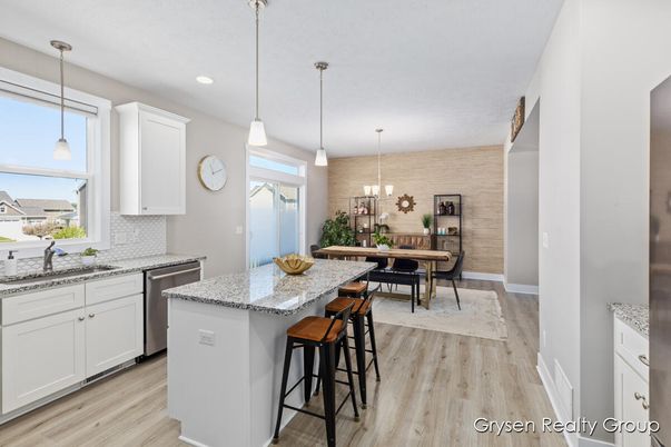 Chandelier, Dining room, Interior, Kitchen, Pendant Lights, Recessed Lighting, Stainless Steel Appliances, Wood Texture Flooring