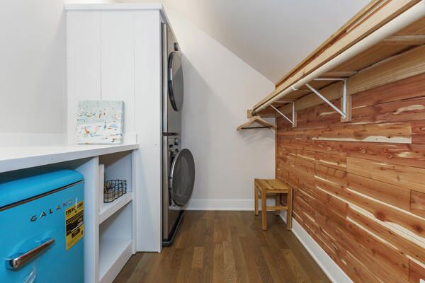 Interior, Utility Closets, Washer, Wood Texture Flooring, Wooden Walls
