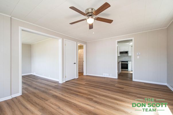 Empty room, Interior, Kitchen, Stainless Steel Appliances, Wood Texture Flooring