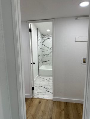 Bathroom, Interior, Marble, Marble Walls, Recessed Lighting, Wood Texture Flooring