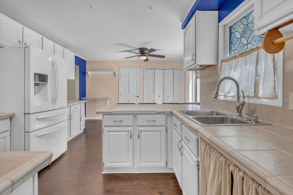 Interior, Kitchen, Tile Countertops, Wood Texture Flooring