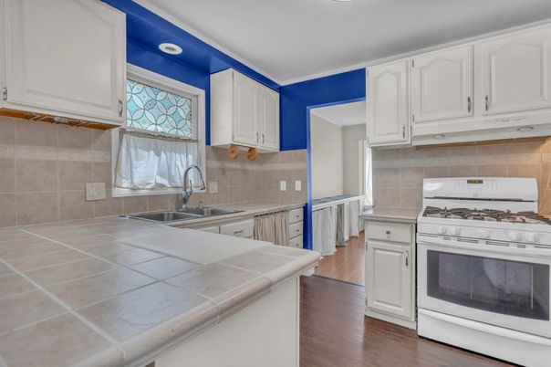 Interior, Kitchen, Tile Countertops, Wood Texture Flooring