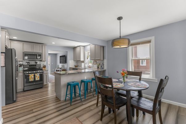 Dining room, Interior, Kitchen, Pendant Lights, Recessed Lighting, Stainless Steel Appliances, Wood Texture Flooring