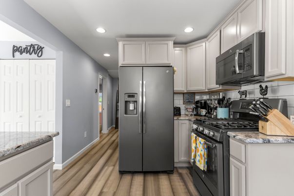 Interior, Kitchen, Recessed Lighting, Stainless Steel Appliances, Wood Texture Flooring